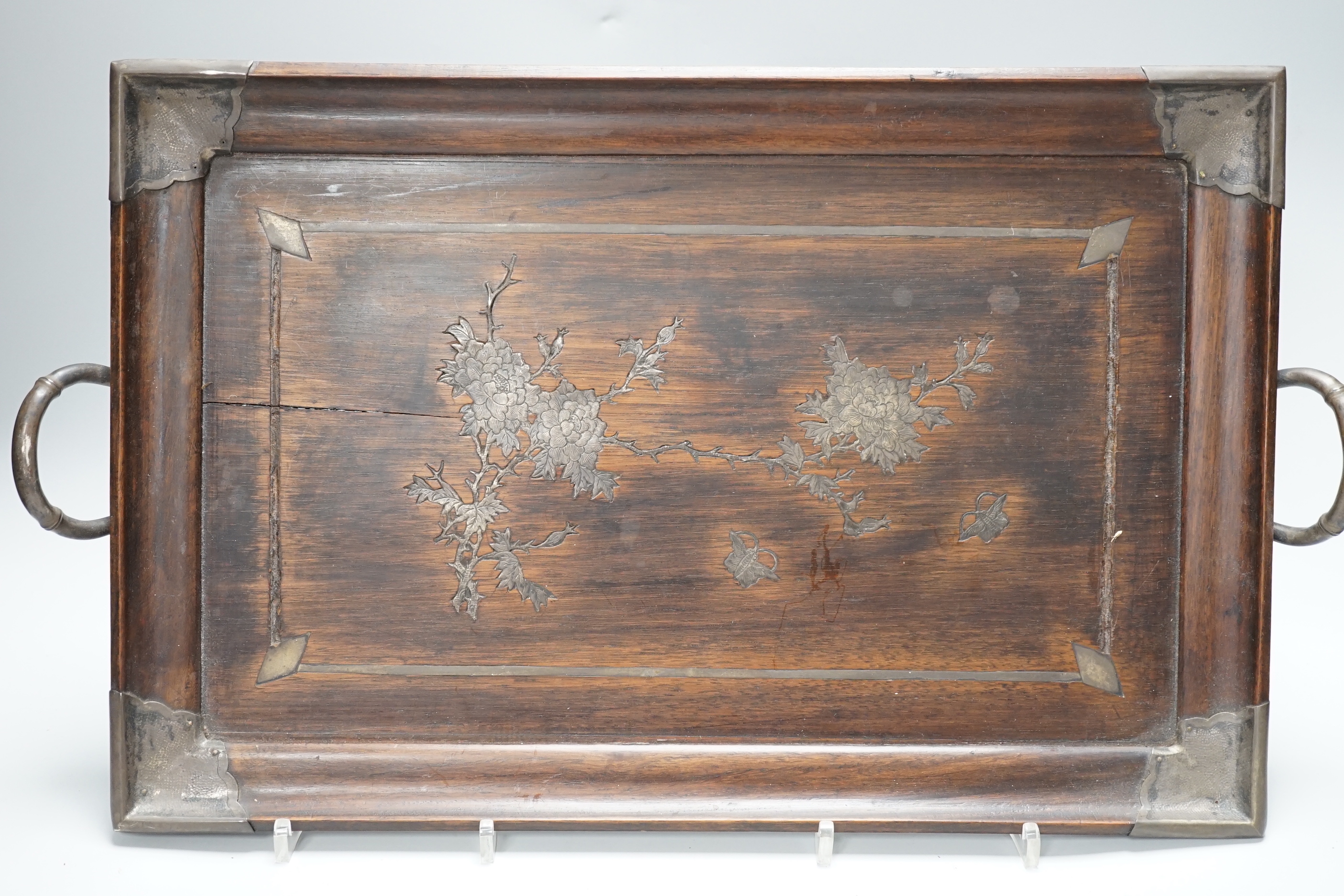 A Chinese white metal mounted hongmu tray and a Chinese carved soapstone table screen on stand, tray 44cm x 29.5cm